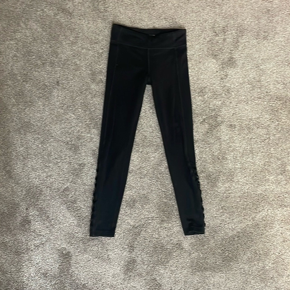 Athlete Girl criss cross bottom leggings Size L(12)